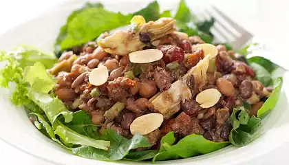 Five Bean, Artichoke and Sundried Tomato Salad with Greens and Toasted Almonds